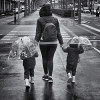 Mom and Two Umbrella Kids, Barcelona, 2021